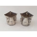 A pair of good quality Edwardian silver planters.