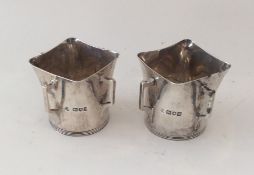 A pair of good quality Edwardian silver planters.