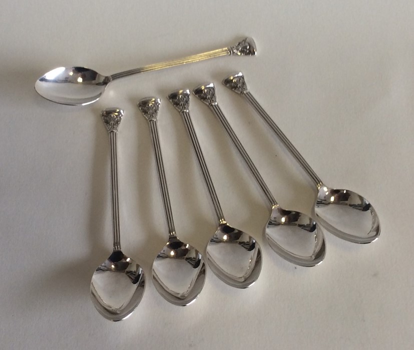 A pair of silver coffee spoons with Corinthian col