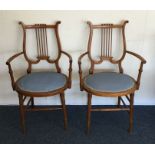 A pair of unusual chairs in the form of harps with