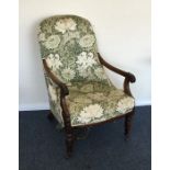 A Victorian hoop back nursing chair on turned supp