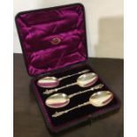 A good set of four cased silver apostle top spoons
