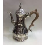 A good quality Georgian silver coffee pot with swi