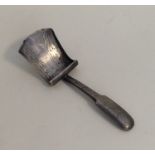 An attractive Georgian silver caddy scoop with eng