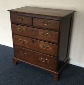 An Antique oak chest of three long and two short d