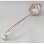 A heavy Georgian OE pattern silver soup ladle with