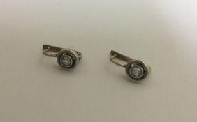 A pair of Antique diamond mounted ear studs of cir