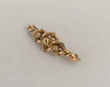 A 9 carat rope twist set brooch with ball decorati