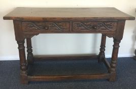 A good Georgian style two drawer desk with stretch