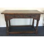 A good Georgian style two drawer desk with stretch