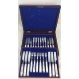 A cased set of twelve (plus twelve) silver and MOP