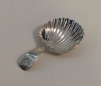 EXETER: A Georgian silver caddy spoon with fluted