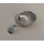 EXETER: A Georgian silver caddy spoon with fluted