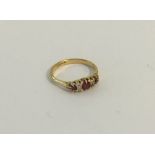A Victorian ruby and diamond ring in 18 carat claw