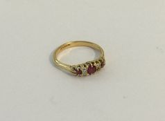 A Victorian ruby and diamond ring in 18 carat claw