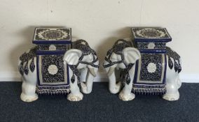 A pair of Continental pottery elephants. Est. £20