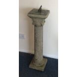 A tapering sundial on square base. Est. £30 - £50.