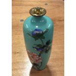 A cloisonné vase decorated in bright colours and a