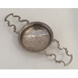 A large rare Georgian silver lemon strainer with s