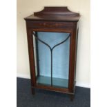 A Victorian cabinet with inlaid decoration. Est. £