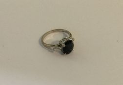 A good diamond and tanzanite three stone ring in 1