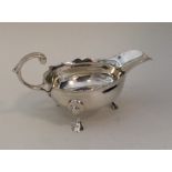 A heavy good quality George II silver sauce boat w