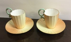 ROYAL WORCESTER: A pair of attractive cabinet cups