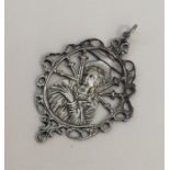 An early Antique religious silver pendant with loo