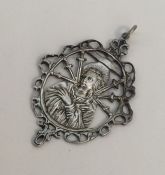 An early Antique religious silver pendant with loo