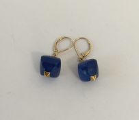 A pair of 9 carat mounted lapis drop earrings. App