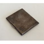 A heavy engine turned silver cigarette case. Birmi