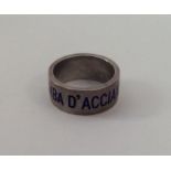 A rare and unusual silver ring inscribed with enam