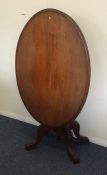 A Victorian mahogany hinged top tea table. Est. £4