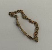 A 9 carat gent's identity bracelet. Approx. 10 gra