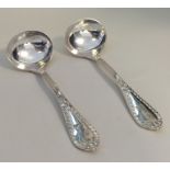 A pair of good quality silver plated sauce ladles