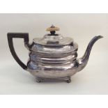 A good quality Georgian silver teapot with crested