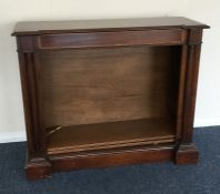 An Edwardian break front inlaid bookcase. Est. £30