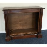 An Edwardian break front inlaid bookcase. Est. £30