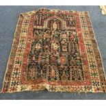 A small Oriental rug. Est. £25 - £35.