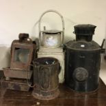 A group of old painted and other railway lamps. Es