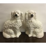 A pair of Staffordshire dogs. Est. £10 - £20.