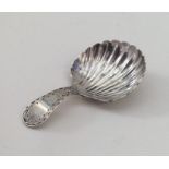 EXETER: A bright cut silver caddy spoon with flute