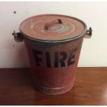 An old galvanised fire bucket. Est. £20 - £30.