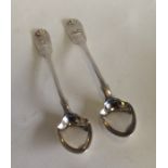 A pair of unusual silver crested egg spoons. Londo