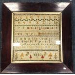 A rosewood framed sampler. Est. £25 - £35.