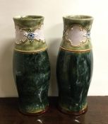 ROYAL DOULTON: A pair of tall stoneware vases. Num