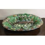 A Continental Palissy ware style shallow dish moun