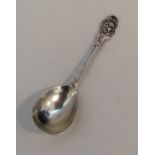 An unusual Victorian silver jam spoon decorated wi