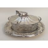 A good quality rare silver and glass butter dish o