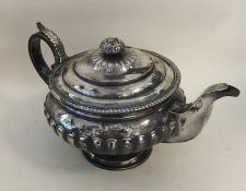 EDINBURGH: A heavy Scottish silver half fluted tea